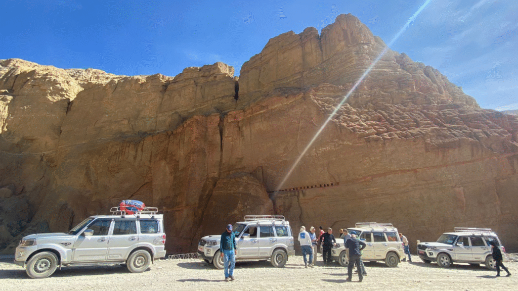 Luxury Jeep Tour exploring Upper Mustang's desert and cliffs.